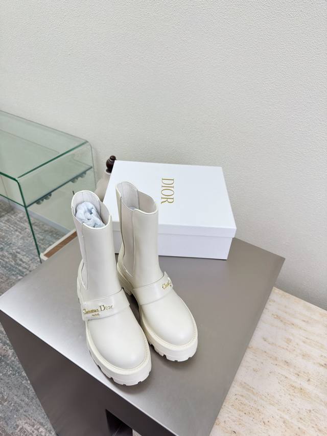 Chelsea boots, Dior thick-soled ankle boots with metal lettering and logo decor