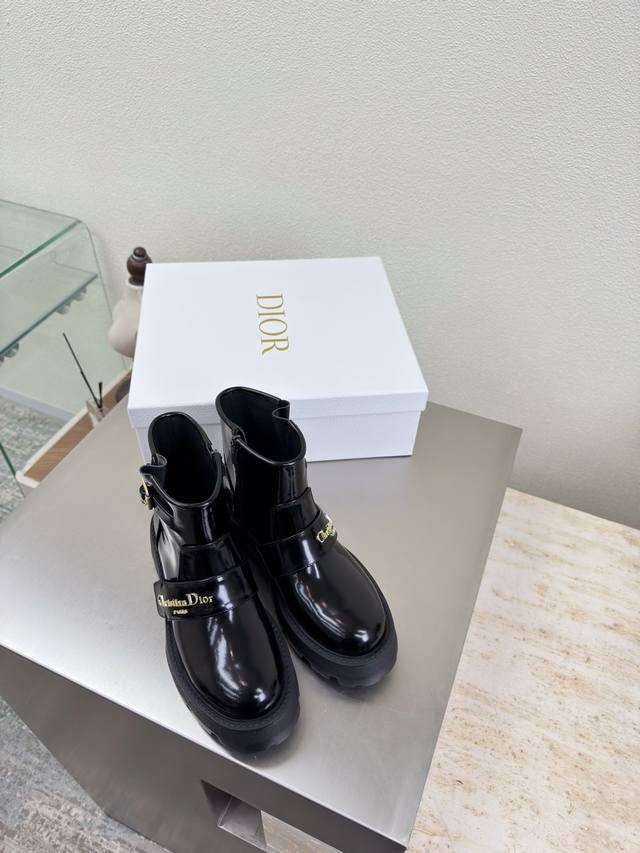 Dior thick-soled metal letter logo-embellished ankle boots. True to the original