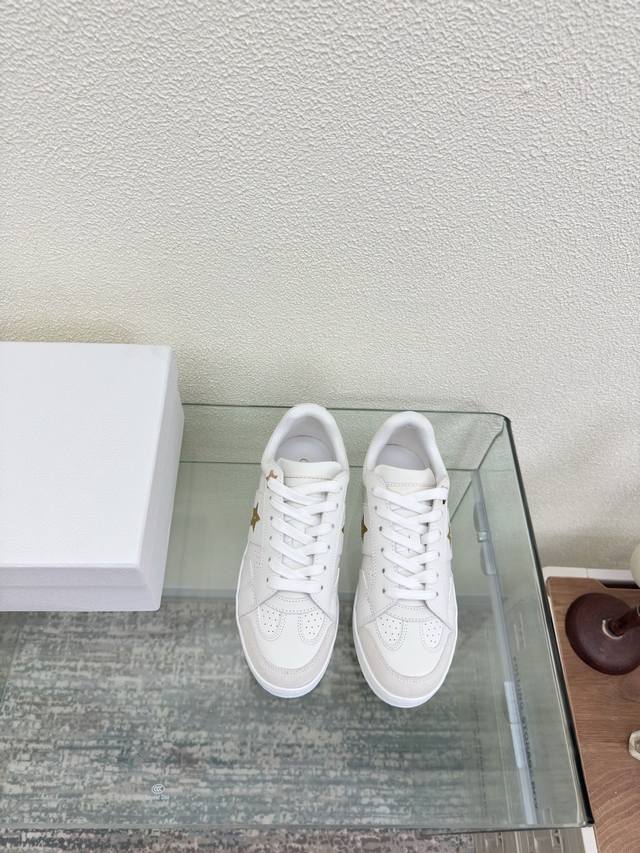 Dior thin-soled sneakers , identical to the original . White top-grain cowhide