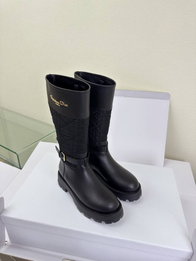High-end, exquisitely crafted down-feather knee-high boots from Dior. Thick sole