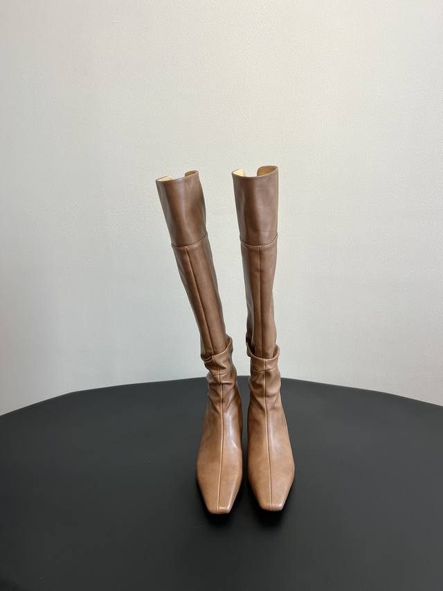 The Row minimalist ceiling Chelsea boots, retro small pleated high boots , as a
