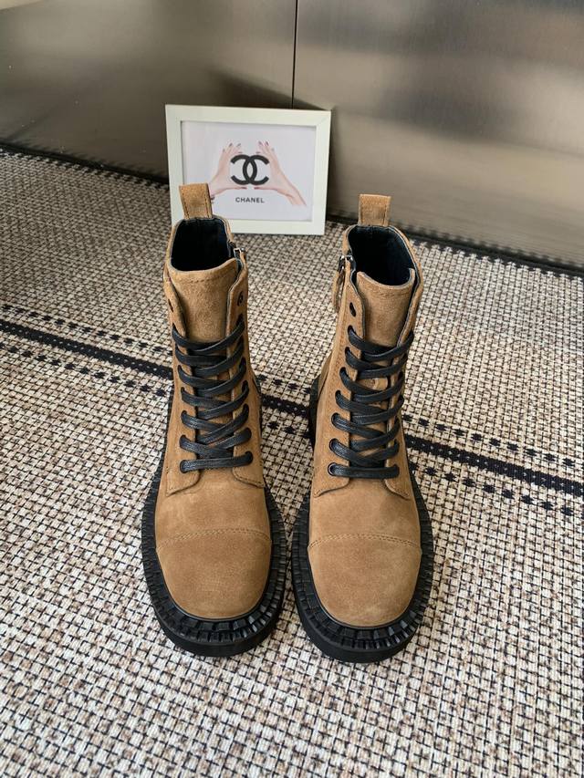 Prada's classic triangle-shaped Martin boots. This year's hot item. They look s