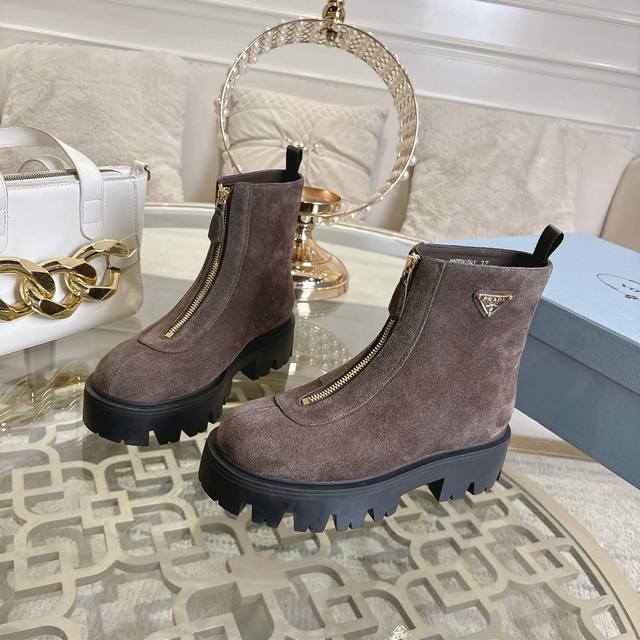 is out, a new Prada model, made of high-gloss denim with imported sheepskin lin