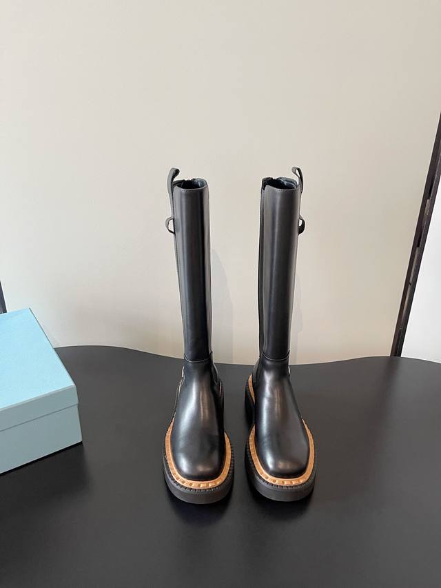 Prada's latest elasticated, thick-soled motorcycle boots are stylish and casual