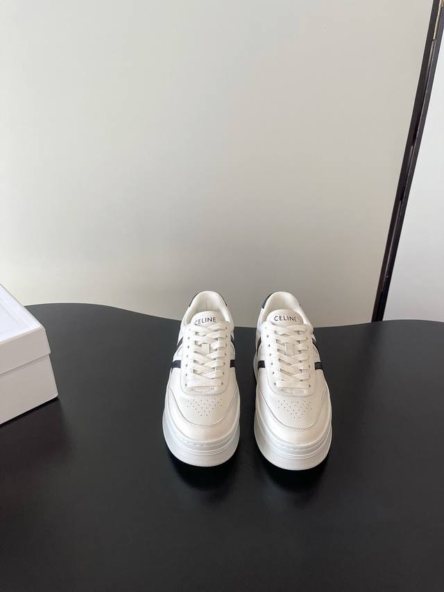 Celine's latest thick-soled, retro-inspired Trainer white sneakers ( ) are now a