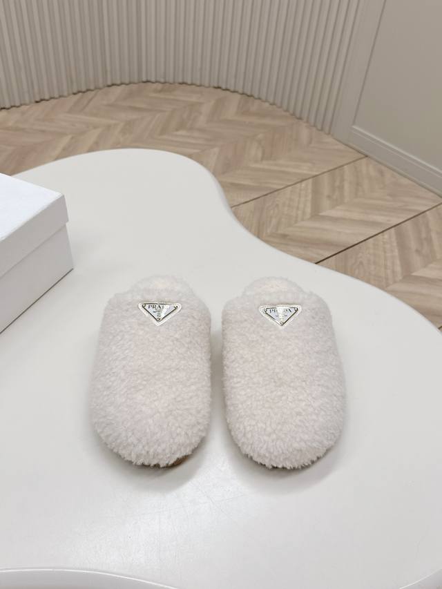 Prada 24 Autumn/Winter Furry Slippers Collection. These half-slip wool slippers