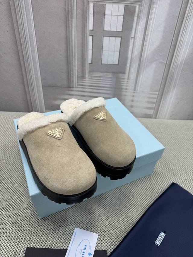 Top-of-the-line Prada's latest retro triangle-label sneakers. Originally source