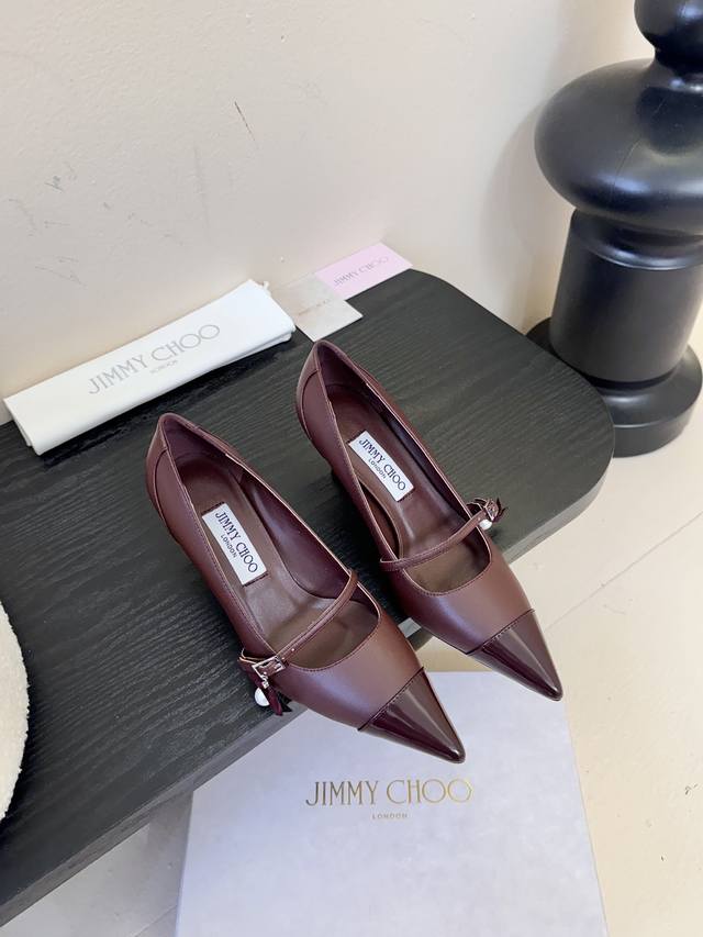 Jimmy Choo inlays sleek, lustrous tones on the toes, brightening your outfit and