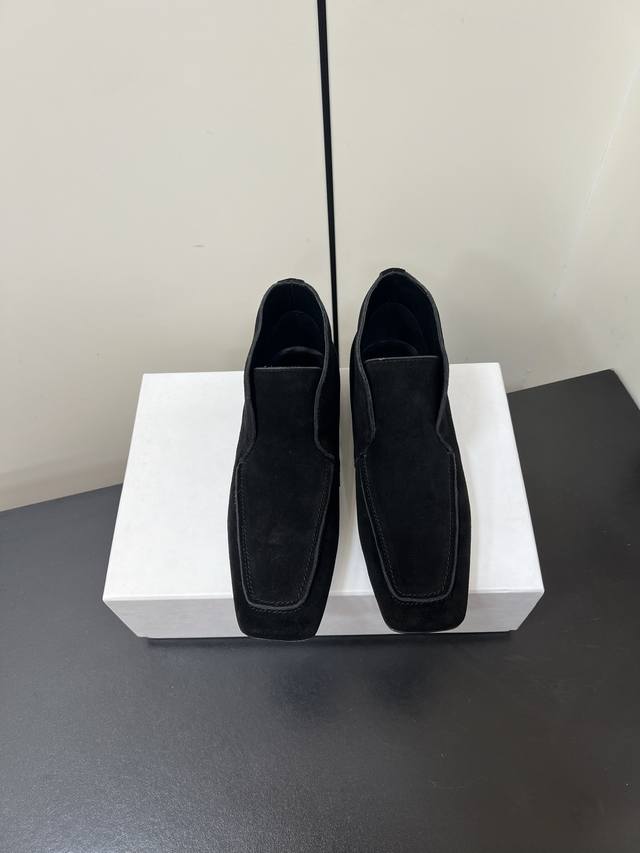 Toteme 25Ss new square-toed high-top loafers feature a simple, slip-on design, e