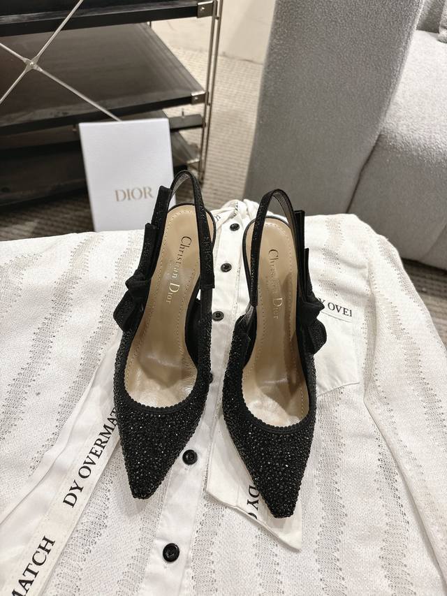 Dior's classic webbing kitten-heel sandals are the pinnacle of Dior elegance. Co