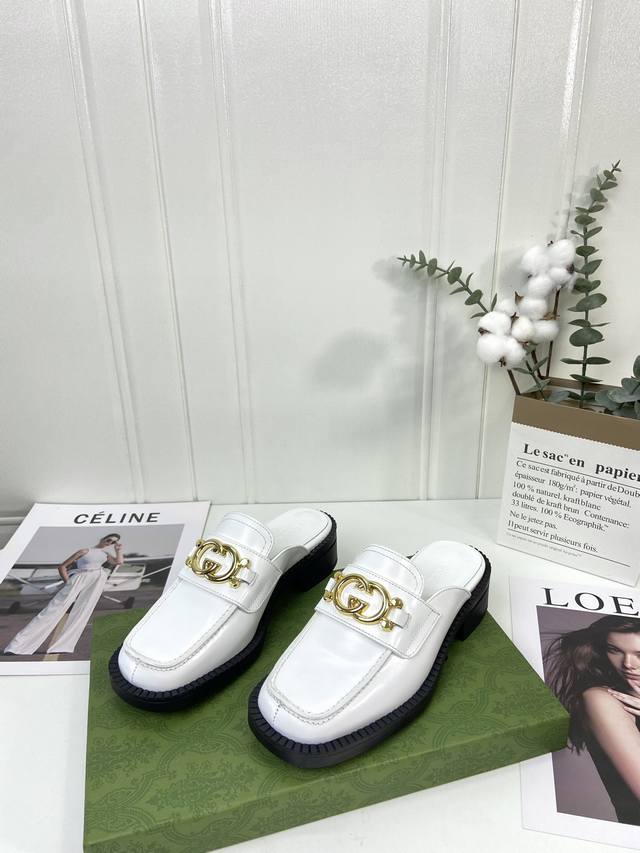 gucci | Gucci's latest autumn collection: these metal-stamped loafers with large