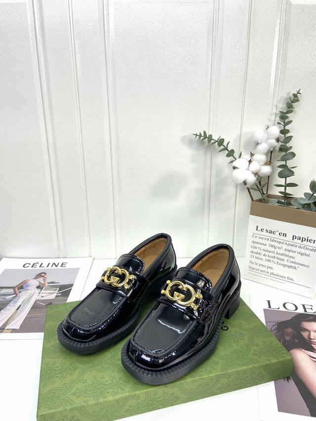 gucci | Gucci's latest autumn collection: these metal-stamped loafers with large