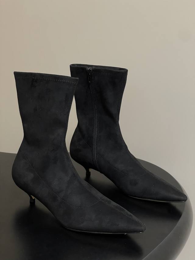 The Row's new Tr stretch ankle boots and kitten heel boots for Early Fall 2025.