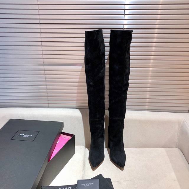 Saint Laurent YSL all-lambre high-heeled boots. The natural folds on the upper