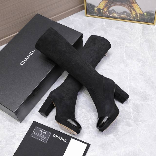 Chanel | Chanel's classic fall/winter stretch boots. These are the most comforta