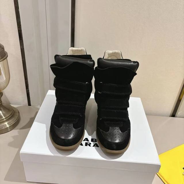 Isabel Marant's latest Fall/Winter high-top sneakers. A must-have for many celeb