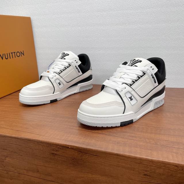 New Lv Trainer Men's Sneakers - Shipped! This Lv Trainer sneaker is crafted from