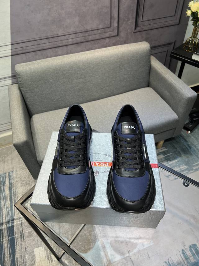 Prada men's shoes, a popular style in boutiques, synchronized with the official