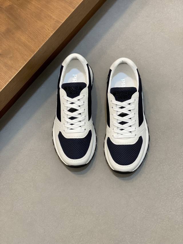 Prada Men's New Sporty Casual Shoes. These shoes feature an upper crafted from i