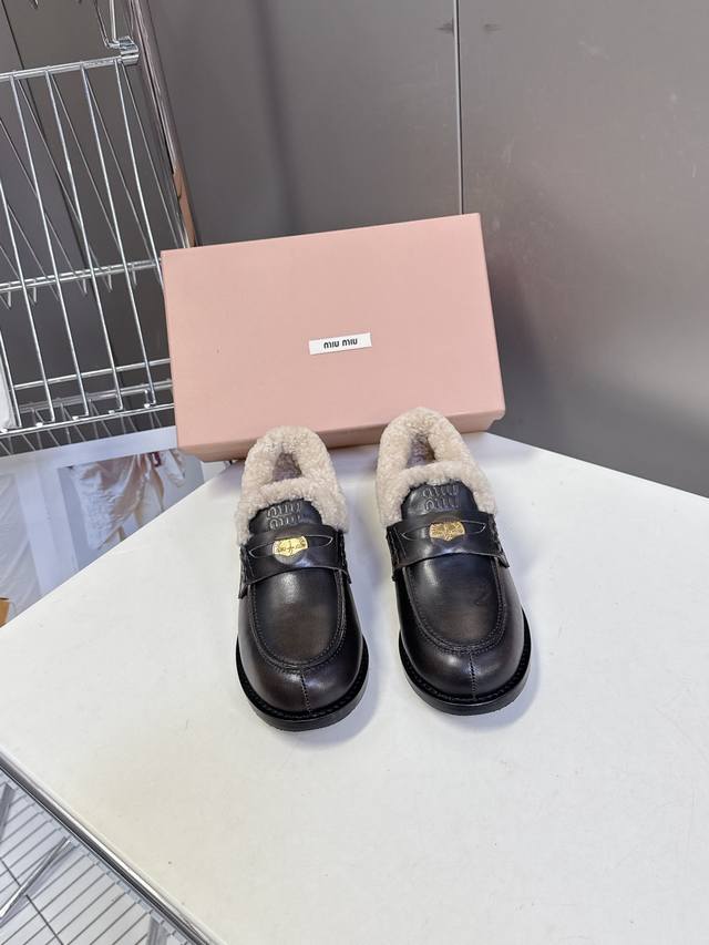 Miu Miu's latest Fall/Winter Coin Loafers - These fluffy loafers are loved by ma