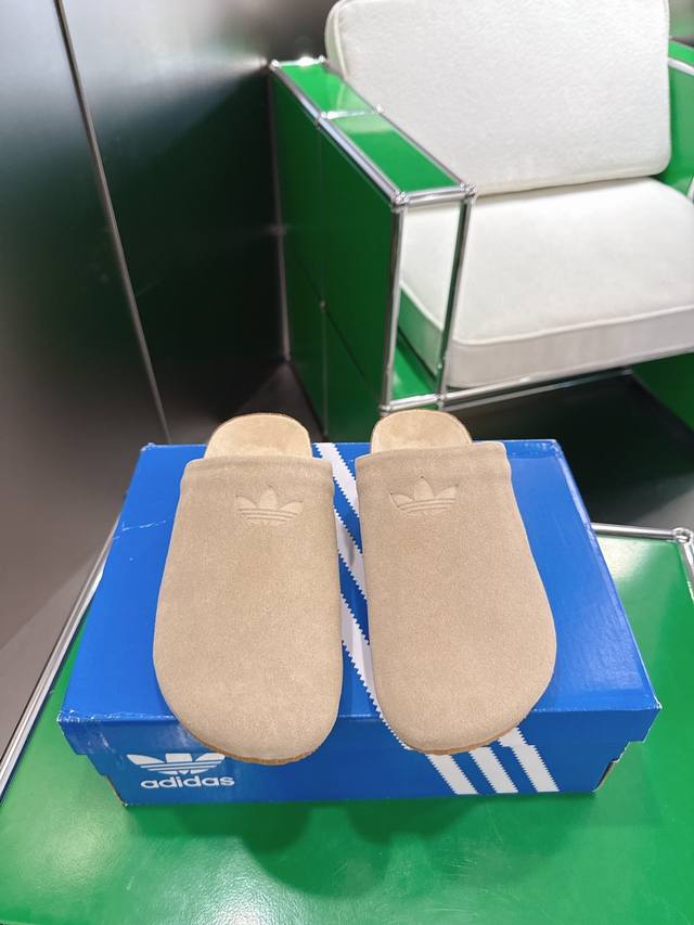 K001 Adidas Comfortable Casual Slip-on Mules These Adimule slip-ons elevate the