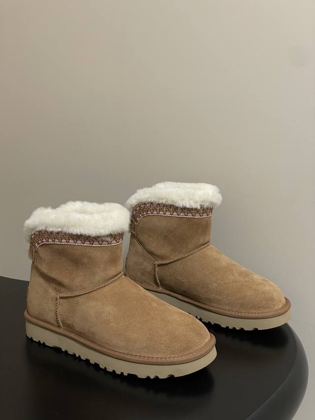 Ugg. Tired of classic shearling snow boots? Need something more embellished this