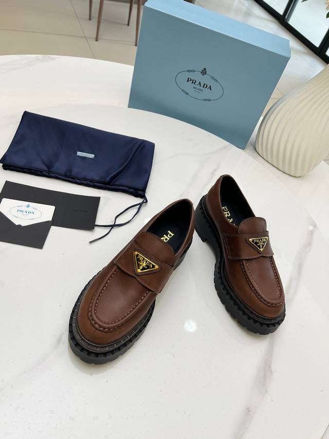 Prada Thick-Soled Retro Leather Loafers with Triangle Logo Fashionable Thick-Sol