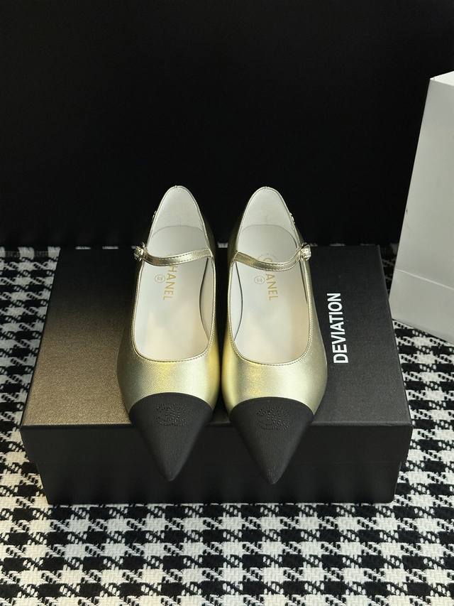 Chanel-style pointed-toe Mary Jane shoes. Elegance is etched into the design. Th