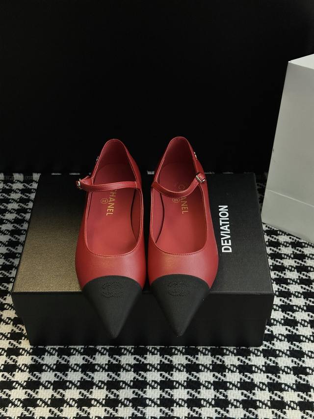 Chanel-style pointed-toe Mary Jane shoes. Elegance is etched into the design. Th