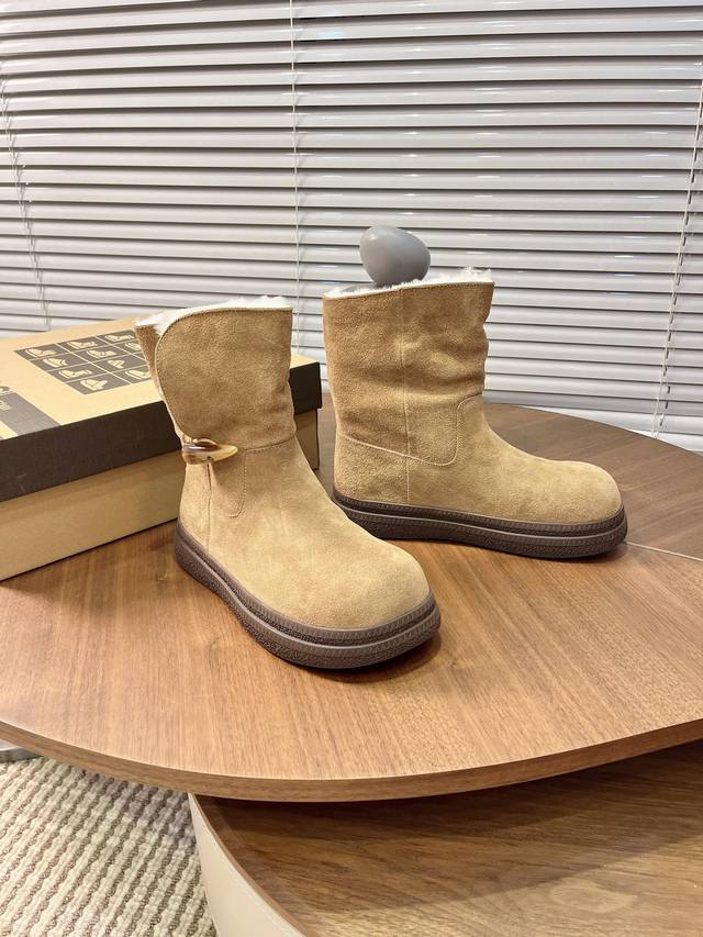 Price: Short Snow Boots Features: Toggle buckle design on the side of the boot s