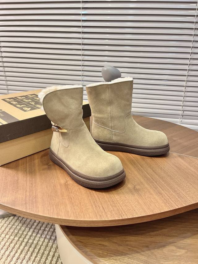 Price: Short Snow Boots Features: Toggle buckle design on the side of the boot s