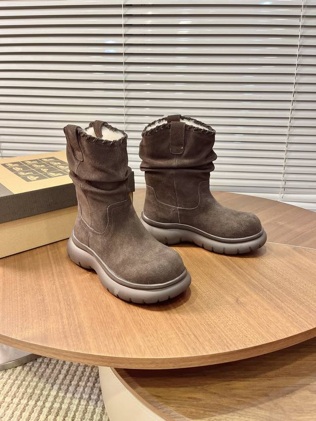 Price: Short Snow Boots Features: Exclusive pleated design on the boot shaft for