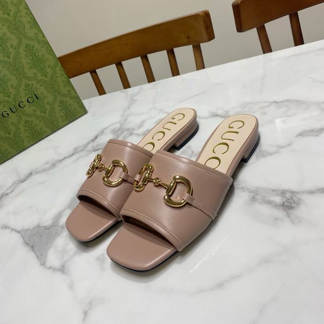 Gucci square-toe chunky-heeled sandals, featuring a classic saddle buckle, consi