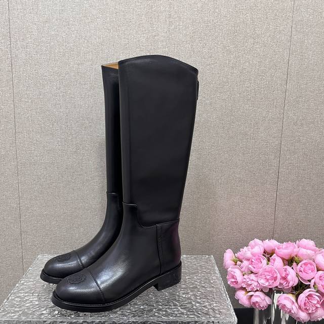 Chanel Fall/Winter Lambskin High Boots with Back Zipper Rider Boots. The design