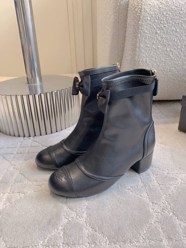 Mesh and Leather Chanel New Mesh Bow Ankle Boots. Recommended by many celebritie