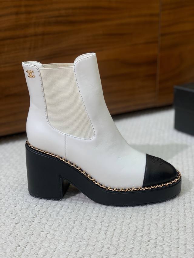 Chan*L platform motorcycle boots. Features a 1:1 elasticated cuff for easy on an