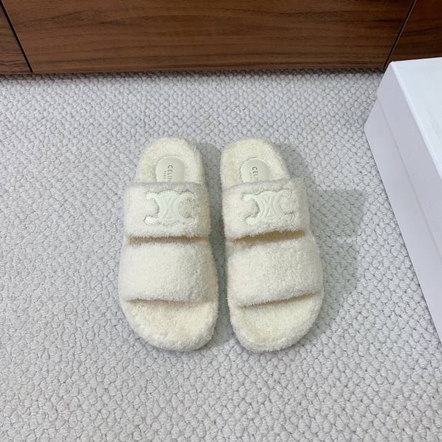 Celi*E fuzzy slippers. The upper is made of the same terry cloth as the original