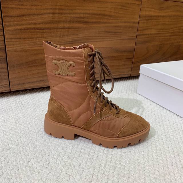 Celi*E Autumn/Winter Ankle Boots. Triumphal Arch embellishment mid-calf boot sty