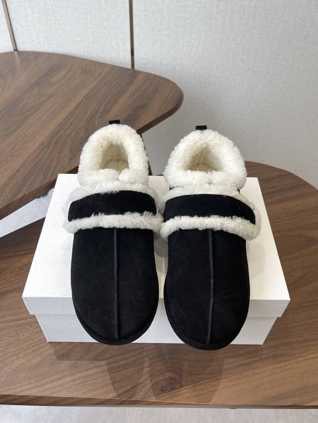 The Row sheepskin boots, made in Dongguan 25 years ago, are the latest style. Th