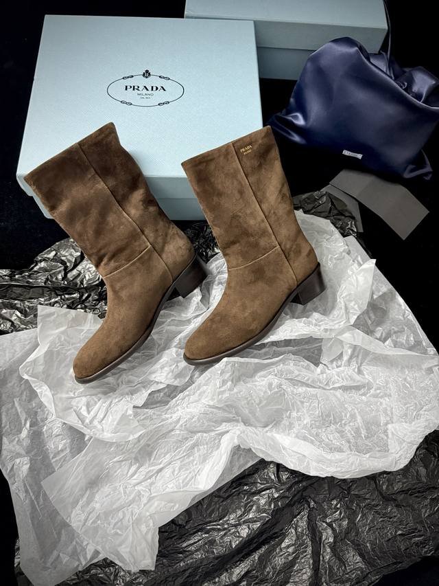 Prad* New Arrival This suede black boot perfectly blends cool and sophisticated