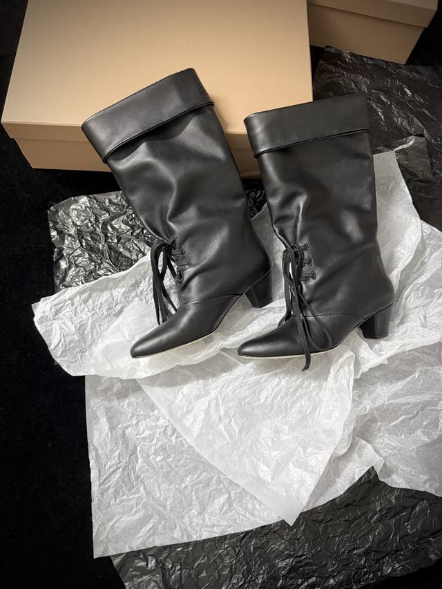 London Flat New Arrival Minimalist Slouch Boots. The pleated design exudes a rel