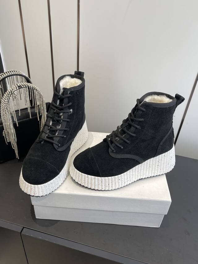 Chloe's new snow boots are now available at boutiques. Made with imported cow su