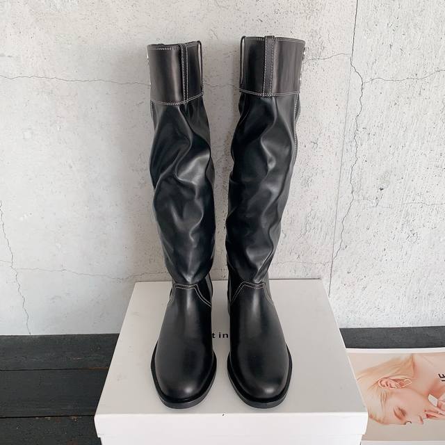 Lort In Echo Autumn/Winter New Arrival Slouch Boots. Features a stacked button a