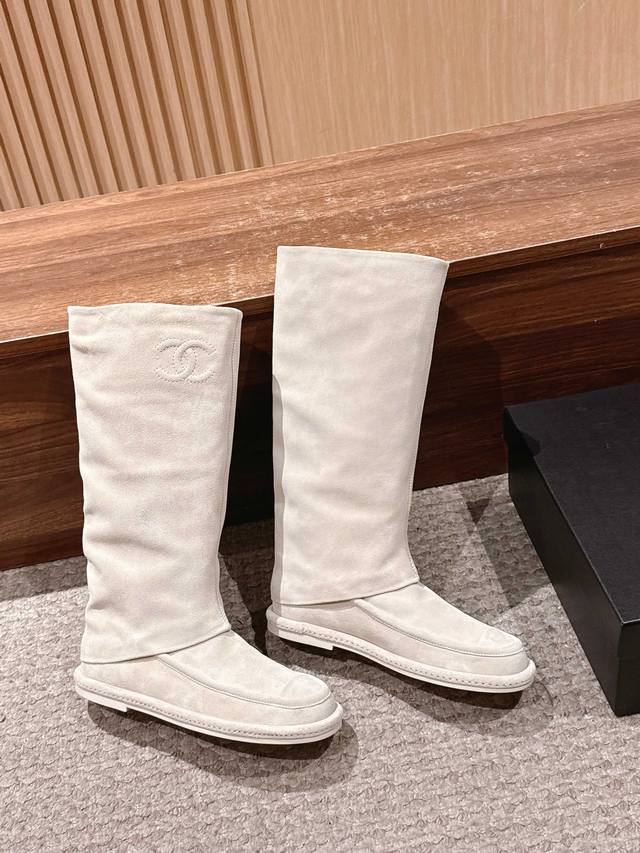 Chanel's newest and most beautiful suede long boots. These Chanel boots are abso