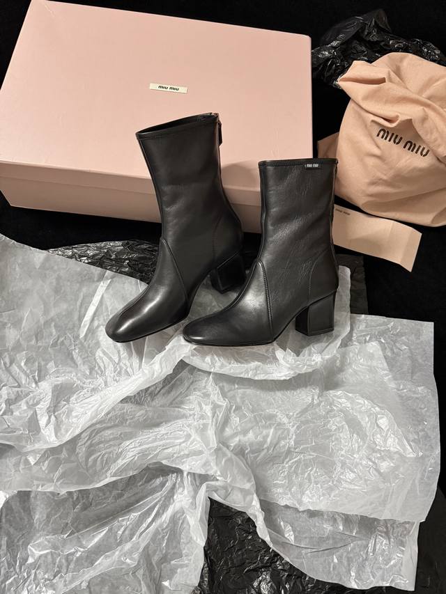 Miu Mi* New Arrival These ankle boots perfectly blend cool and elegant styles. T