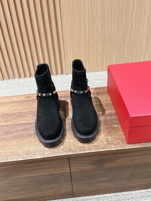 Dongguan-made Valentino Classic Riveted Dr. Martens Boots On a chilly winter's d