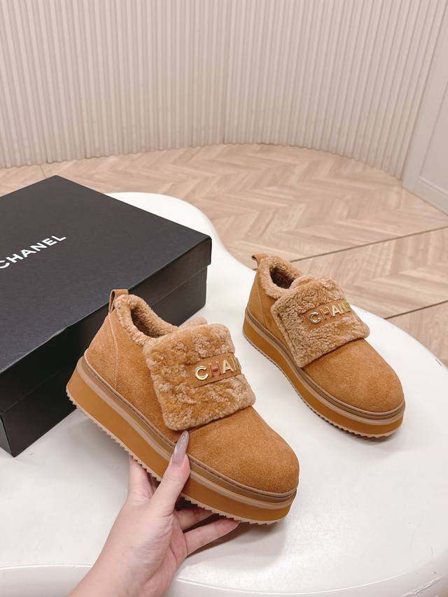 Chanel classic loafers/boots with suede and wool uppers exude a sophisticated an