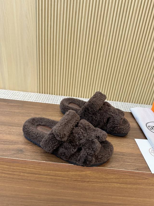 Hermes Shearling Rolled Fleece Slippers. This year's materials are all A+ shearl