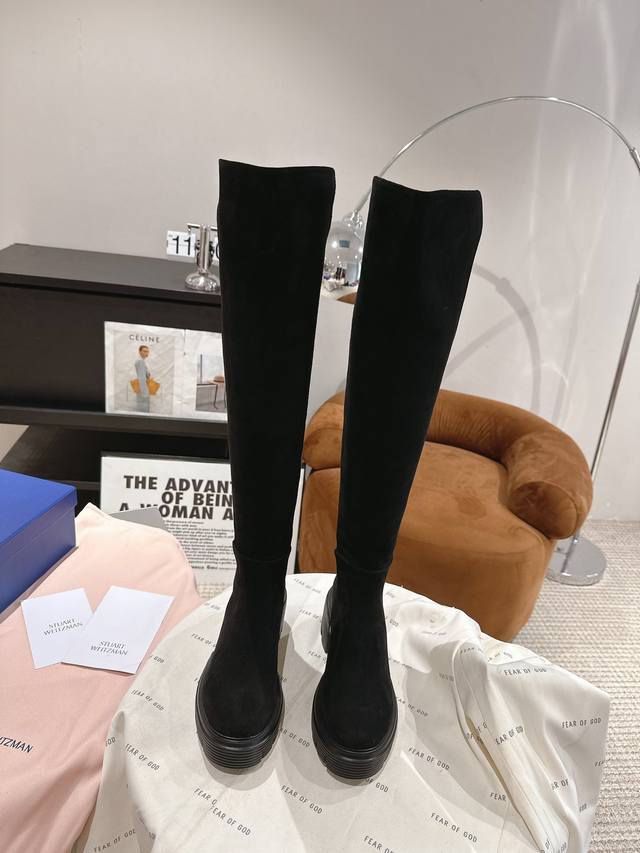 Dongguan-made Stuart Weitzman Soho knee-high boots feature a striking Soho groov