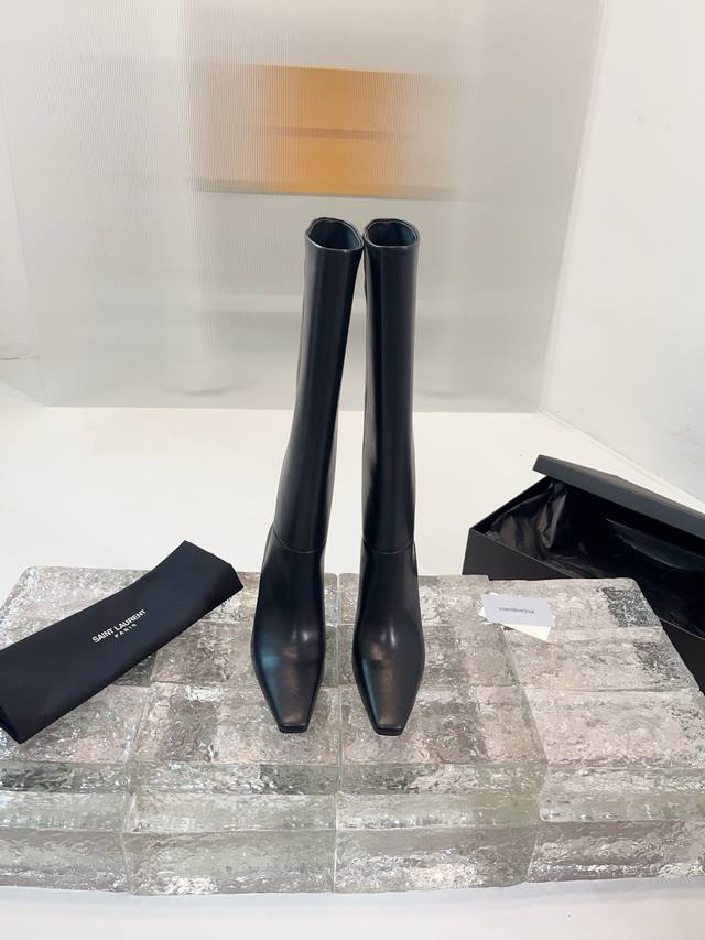Saint Laurent high-heeled boots. The design highlight of these YSL boots is thei